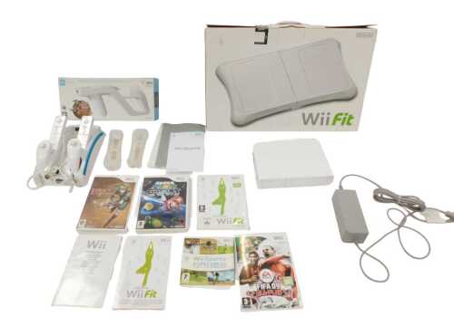 A white Nintendo Wii and Wii Fit, with various games and accessories, to include Super Mario...