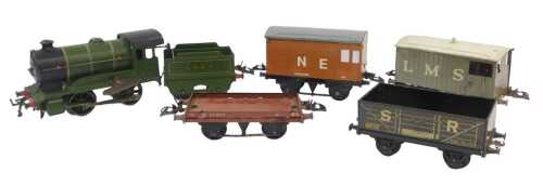 Hornby O gauge clockwork tinplate locomotive and tender and rolling stock, including an LMS...