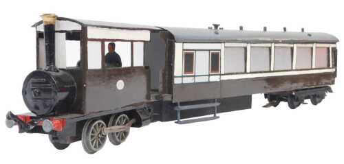 A scratchbuilt OO gauge locomotive and coach.