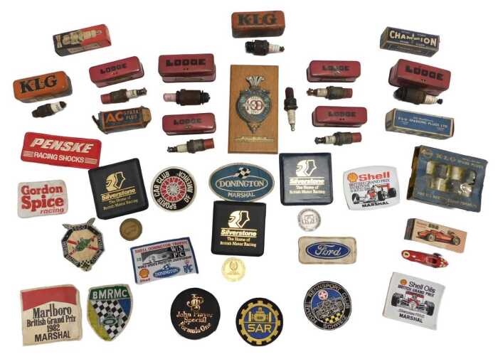 Various motor racing related ephemera, including Silverstone medals, overall patches, and...