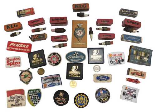 Various motor racing related ephemera, including Silverstone medals, overall patches, and...