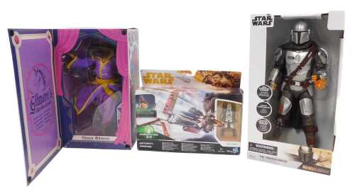 A Star Wars The Mandalorian talking action figure, together with a McFarlane Toys Shaun Gilmore...