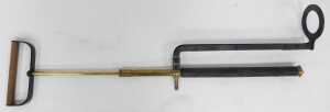 A waxed smock and a stirrup pump. - 3