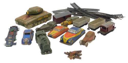 Various tinplate and diecast toys, including a police car, tinplate GTP taxi, an MF779 tank,...