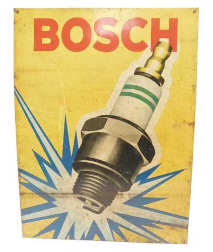A Bosch Spark Plug tin sign.