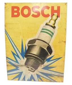 A Bosch Spark Plug tin sign.