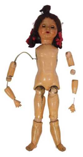 A composition doll, with papier mache limbs, etc., 59cm high. (AF)