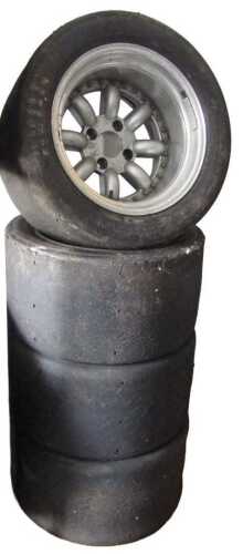A set of Avon Racing slicks, on five spoke alloy wheels, and three Conti Premium Contact 2 tyres,...