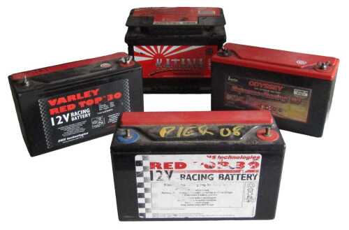 Three 12 volt racing batteries, including an Odyssey Extreme Racing battery, a Red Top 30 12...