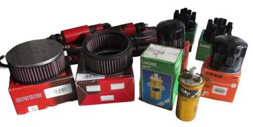 Car parts, including distributor caps, K&N air filters, Lucas ignition coil, Fram oil filter,...