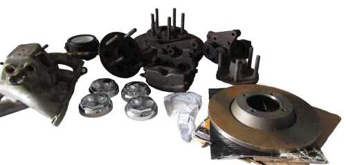 Various brake discs and racing callipers, wheel hubs, a pair of AP racing callipers, etc. (a...