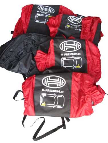 A set of H Premium tyre covers.