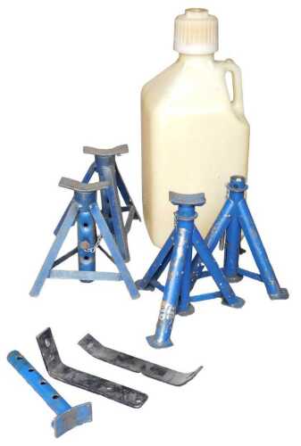 Two pairs of axle stands, and a Scribner Plastics 15 litre jug.