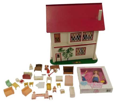 A Gee Bee Toy doll's house, with furniture, and a horseman doll's house family, boxed.