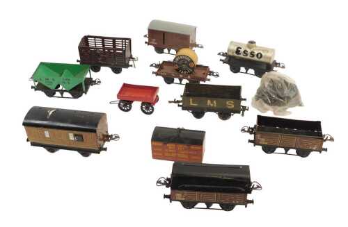 Hornby and other O gauge tinplate rolling stock, including plank wagons, LNER teak coach, Esso...