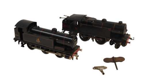 A Bassett Lowke tinplate clockwork 0-6-0 tank locomotive in BR lined black 41611, and a Hornby...