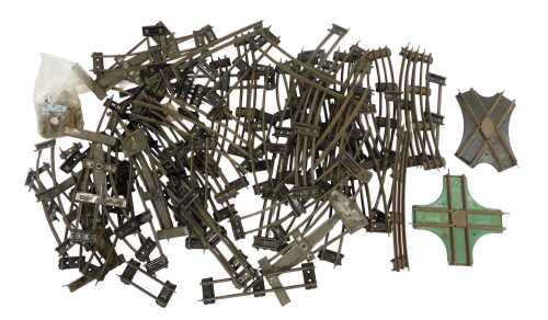 A quantity of O gauge clockwork track, incling straights, curves, crossover etc (1box)
