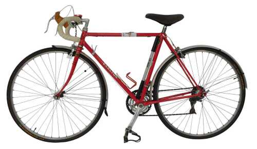 A Carlton Cycles Limited of Worksop bicycle, constructed from Reynolds 531 tubes and forks, handcut lugs with a Shimano Alvio gear set, Alhonga brake set, and Continental gator skin tyres.