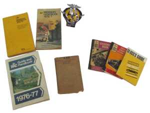 An AA Members badge, and RAC and AA Members handbooks, including 1976-77, 1972-73, etc. (a...