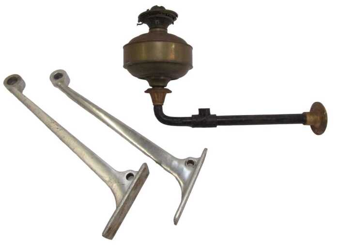 A pair of British Rail luggage rack brackets, and a Midland Railway Company oil lamp and sconce....