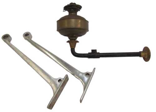A pair of British Rail luggage rack brackets, and a Midland Railway Company oil lamp and sconce....