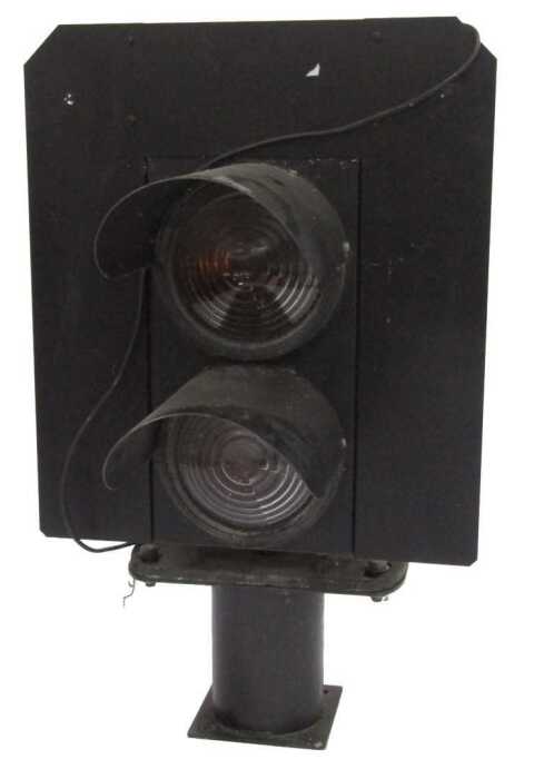 A Westinghouse two aspect signal head, with amber and red glasses.