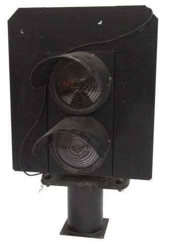 A Westinghouse two aspect signal head, with amber and red glasses.
