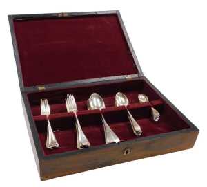 An Edward VII and later silver canteen of Old English pattern harlequin cutlery, comprising six...