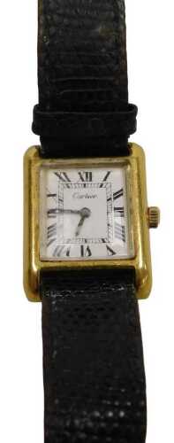 A Cartier lady's tank pre-must 18ct gold plated lady's wristwatch, square dial bearing Roman...