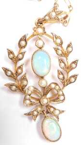 An Edwardian opal and seed pearl pendant, of wreath and tied bow form, unmarked, on a neck chain... - 2
