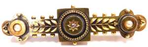 A Victorian diamond and seed pearl set Etruscan style brooch, yellow metal, stamped 15ct, 3.7g,... - 2