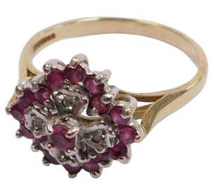A 9ct gold ruby and diamond flower head ring, in a lozenge claw setting, size R, 3.1g all in.