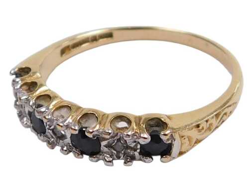 A 9ct gold sapphire and diamond seven stone ring, in a claw setting, size N&frac12;, 1.7g all in.