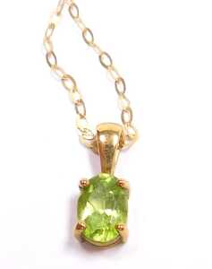 A 9ct gold and peridot pendant, on a fine link neck chain, with bolt ring clasp, stamped 9ct, 1.1g. - 2