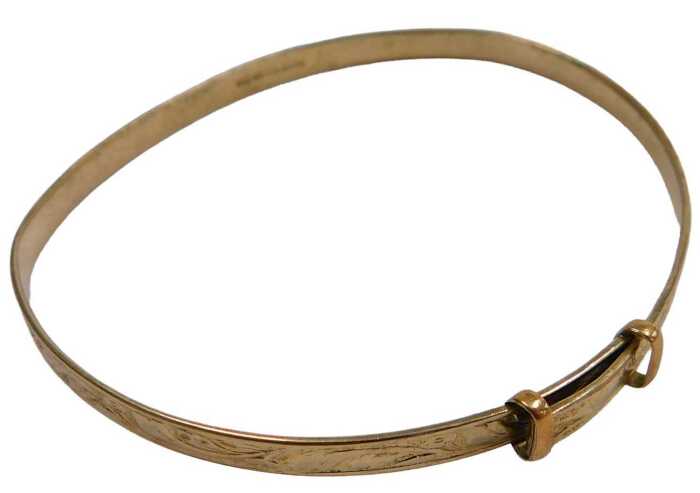 A 9ct gold plated bangle, with foliate engraving, with sliding adjustment.