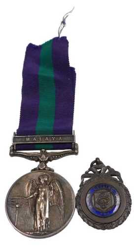 A Queen Elizabeth II British General Service medal, with Malaya clasp, named to CFN A Douglass,...