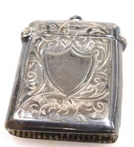 An Edward VII silver vesta case, with engraved foliate decoration, vacant shield reserve,... - 2