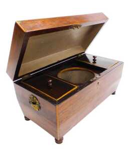 A Regency rosewood tea caddy, of sarcophagus form, the hinged lid opening to reveal two lidded...