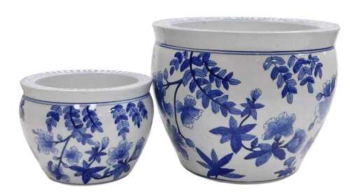 A pair of Chinese blue and white porcelain graduated jardinieres, decorated with flowers and...