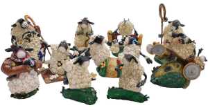 A collection of Inesco Philip Stuttard sheep figures, comprising The New Hare Stile, Spring Lamb,...