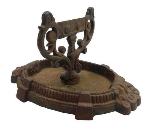A Victorian cast iron boot scraper, 33cm deep.