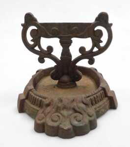 A Victorian cast iron boot scraper, 33cm deep. - 2