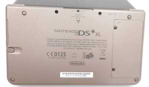 A Nintendo DS, cased, and games, comprising Hidden Mysteries Buckingham Palace, Real Crimes Jack... - 2