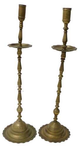 A pair of 19thC brass altar stands, each on a lotus base, 70cm High. (AF)