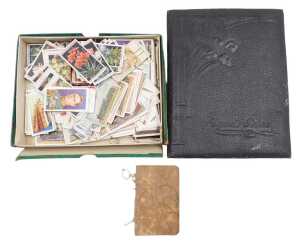 Cigarette cards. In an album and loose, including Wills's Flower Culture in Pots, John Player...