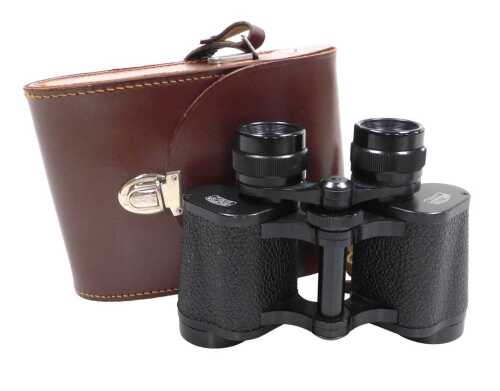 A pair of Carl Zeiss Jenoptem 8x30W binoculars, cased.