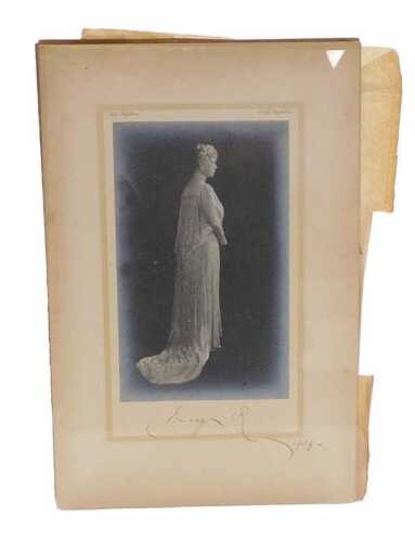A signed photograph of Queen Mary, by the photographer May Wrightson, 41 New Bond Street, dated...