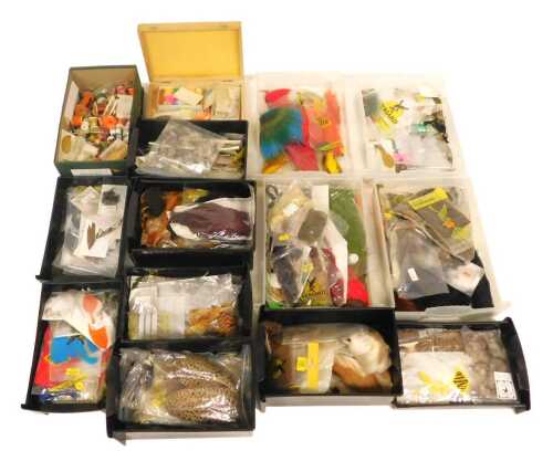 A large selection of fishing fly dressing materials, including tying capes, hackles, fur tippets,...