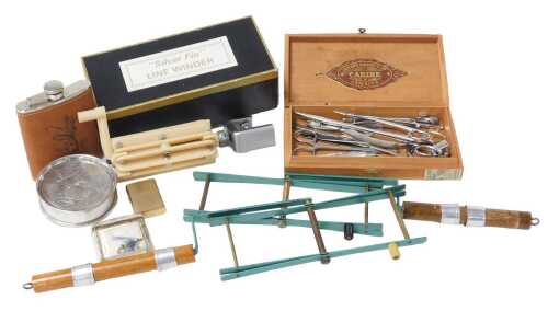 Fishing line winders and other fishing related items, including a Silver Fin line winder in...