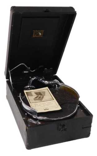 An early 20thC HMV portable gramophone, model 102, black cased, with instructions.